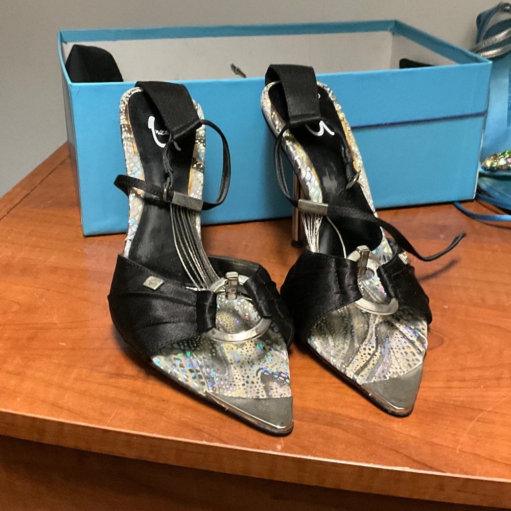 Signature metal heels satin ,made in Italy.